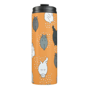 Fat, fluffy cats are lying on their backs. Cute co Thermal Tumbler
