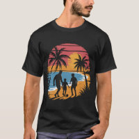 Father and 2 sons playing soccer at the beach