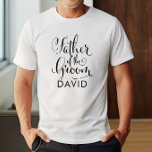 Father of the Groom Calligraphy Name T-Shirt<br><div class="desc">Honour the father of the groom with this striking brush calligraphy tee featuring bold "Father of the Groom" script and a customisable first name. A meaningful monogram keepsake for rehearsal dinners,  wedding morning prep,  and family wedding photos. Edit the name to personalise.</div>