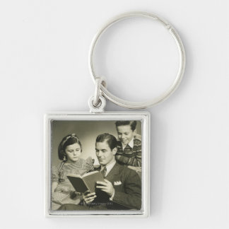 Father Reading to Son Key Ring