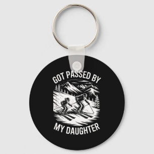 Father skier passed by daughter skiing family key ring