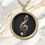 Faux Amber Diamond Treble Clef on Black Music Gold Plated Necklace<br><div class="desc">Stunningly beautiful is this necklace that features a faux gold amber diamond formed treble clef. The image is placed on a black background for dramatic effect,  but you may easily change the background colour by customising it. Perfect for the music student,  teacher,  or performer! *Design credit to ThingsByLary.</div>