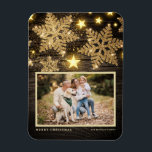 Faux Wood Gold Glitter Snowflakes Photo Christmas Magnet<br><div class="desc">Celebrate the holiday spirit with our customisable photo Christmas magnet! Perfect for capturing your favourite festive moments, this magnet allows you to create a unique keepsake that showcases your family’s joy and love during the holiday season. It features gold glitter snowflakes and stars on a faux wood background. Personalise by...</div>