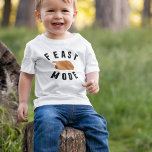 Feast Mode | Thanksgiving Turkey Baby Baby T-Shirt<br><div class="desc">Is your baby training up for Thanksgiving dinner? Get him ready with this funny raglan tee. Funny Thanksgiving design features "FEAST MODE" in black block lettering,  with a delicious roast turkey illustration.</div>