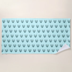 Feather heart in soft green beach towel