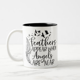 Feathers appear when angels are near Two-Tone coffee mug