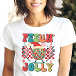 Feelin' Jolly Retro Christmas Vibes Tri-Blend Shirt<br><div class="desc">Spread some holiday cheer with this fun, retro-inspired Christmas design! Featuring a vibrant pattern and playful typography, this shirt is perfect for anyone wanting to embrace the festive season with a nostalgic flair. Whether you’re attending a holiday party or cosying up by the fire, this “Feelin' Jolly” shirt brings the...</div>