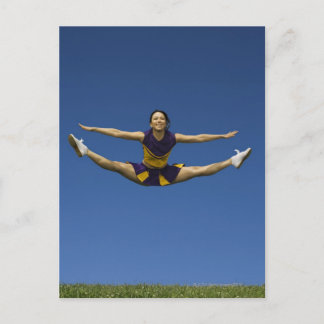 Female cheerleader jumping in air 3 postcard