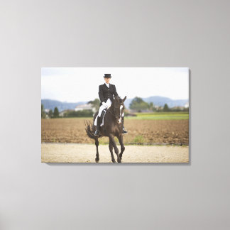female dressage rider exercising canvas print