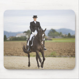 female dressage rider exercising mouse pad