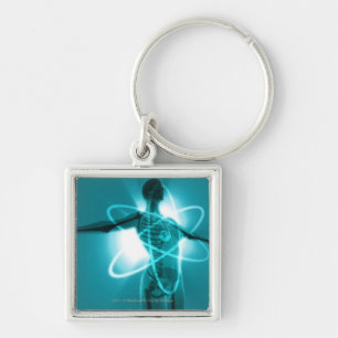 Female figure with an overlay of an atomic symbol key ring
