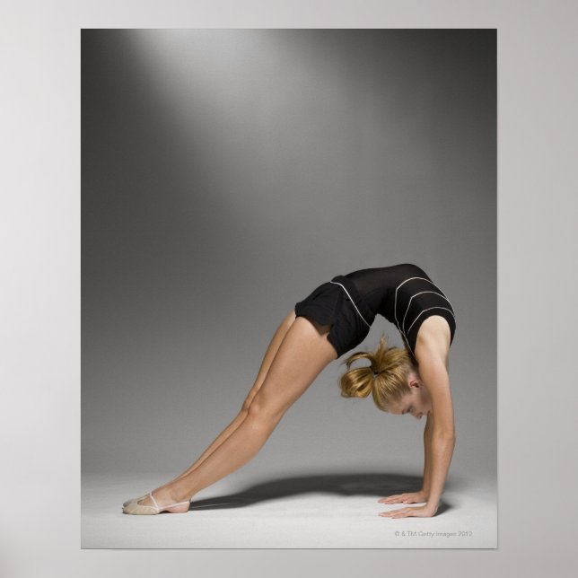 Female gymnast stretching, studio shot 2 poster (Front)