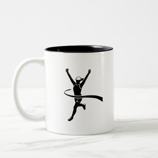 Female Marathon Runner Finishing Race Black Two-Tone Coffee Mug (Left)
