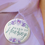 Feminine Purple Wild Rose Floral Hard of Hearing  6 Cm Round Badge<br><div class="desc">Your mother will love this elegant hard-of-hearing badge by JessicaAmber. This button features the slogan 'Hard of Hearing' in elegant script, surrounded by a floral border of purple wild roses. You can edit the text as needed. A great gift for mother's day. 🌹 For more deafness pins, visit my store:...</div>
