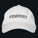 Feminist, black text embroidered hat<br><div class="desc">Show that you support equal rights for women and men by wearing a baseball cap featuring the word "feminist" embroidered in bold black all capital text on a white background. Other colour hats are available in the sidebar. To see the design Feminist on other items, click the "Rocklawn Arts" collection...</div>