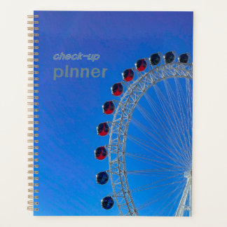 Ferris wheel with a beautiful sky background planner