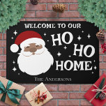 Festive African American Santa Door Mat<br><div class="desc">Festive African American Santa Design – Bring festive joy to your doorstep with this modern Christmas doormat featuring a fun and whimsical African American Santa! The cheerful message, “Welcome to our Ho, Ho, Home, ” is written in a playful font, setting a merry tone for holiday guests. With its bold...</div>