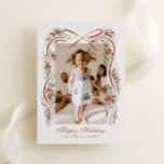 Festive Christmas Ribbon with Poinsettias<br><div class="desc">Send you family and friends a family update and message of holiday cheer with this one-photo Christmas card featuring a trendy, hand-drawn illustration of a rust red ribbon accented with festive sprigs of red poinsettia flowers, greenery and real gold foil metallic berry dots. Traditional fonts keep the design feeling high...</div>