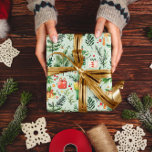 Festive Christmas Themed Seamless Pattern Wrapping Paper<br><div class="desc">Festive Christmas-themed watercolor seamless patterns featuring Christmas trees,  Christmas presents,  and other Christmas symbols on a light green background.</div>