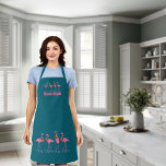 Festive Flamingos Personalized Dark Teal Apron<br><div class="desc">Flamingos on dark teal blue,  bib apron with pink text.  Use for a business or seaside kitchen.  Four flamingos at the top of the apron and four,  larger flamingos at the hemline.  They wear floral wreaths and stand among little blue sea stars.</div>