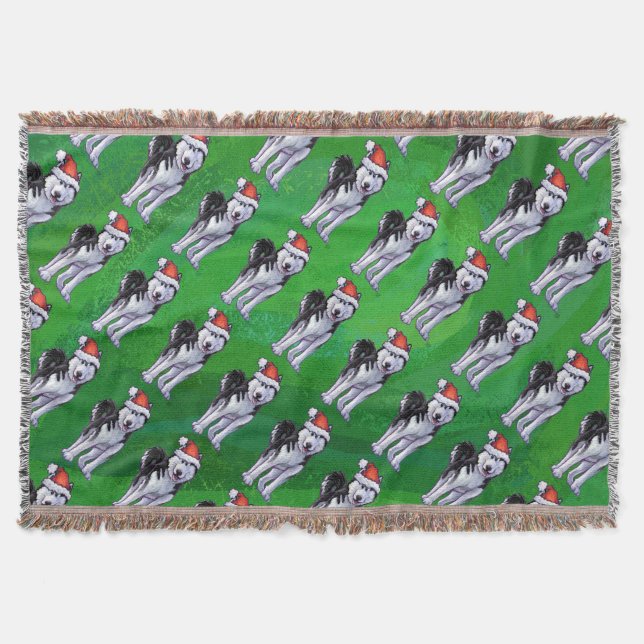 Festive Husky in Santa Hat on Green Throw Blanket (Front)