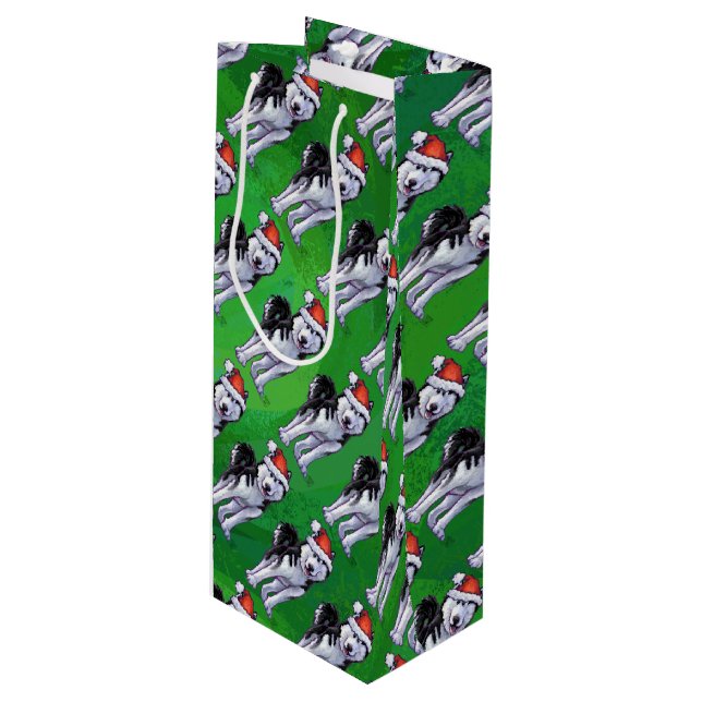 Festive Husky in Santa Hat on Green Wine Gift Bag (Front Angled)