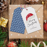 Festive Minimal Santa Hat Cute Whimsical Christmas<br><div class="desc">This minimal "Merry Christmas" gift tag features a hand drawn Santa hat on the front and fun light blue poinsettias on a traditional dark blue background on the back that add a touch of nostalgic whimsy. Original art by Malissa Melrose.</div>