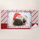 Festive Pug in Red Santa Hat with Christmas Lights Beach Towel<br><div class="desc">A beach towel with a photo of a sweet pug puppy sleeping while wearing a red santa hat. Merry Christmas is written on the band of his hat, in a trendy handwritten font. A black grunge border with colourful holiday lights surround the frame of this adorable photo. The background is...</div>