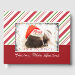 Festive Pug in Red Santa Hat with Christmas Lights Guest Book<br><div class="desc">A Christmas Wishes guest book with a photo of a sweet pug puppy sleeping while wearing a red santa hat. Merry Christmas is written on the band of his hat, in a trendy handwritten font. A black grunge border with colourful holiday lights surround the frame of this adorable photo. The...</div>