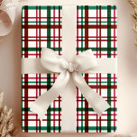 Festive Red and Green Christmas Plaid Pattern Wrapping Paper<br><div class="desc">Celebrate the holiday season with this festive red and green Christmas plaid pattern. The design features a traditional plaid layout in classic holiday colours of red, green, and white, creating a warm and cheerful look. Perfect for adding a touch of holiday spirit to any occasion, this pattern brings a timeless...</div>