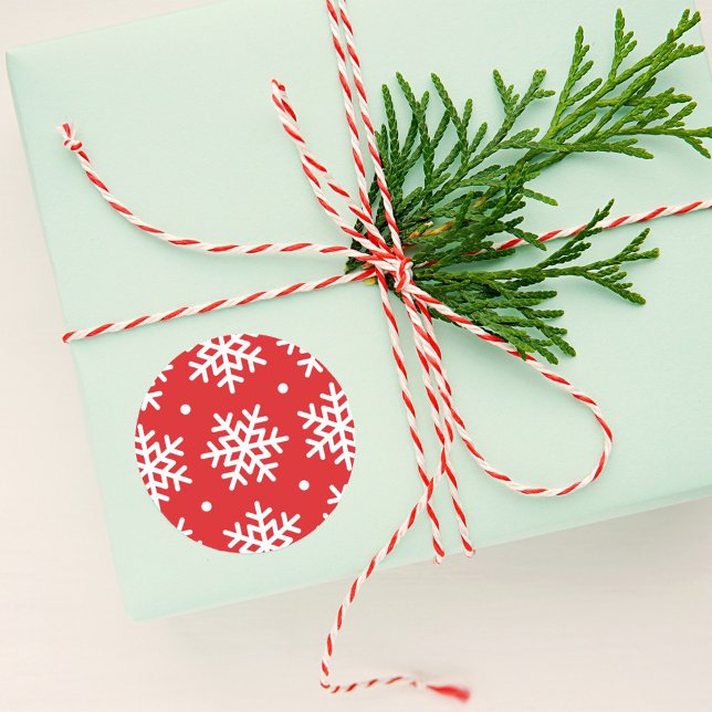 Festive Red and White Snowflake Pattern Holiday Classic Round Sticker (Creator Uploaded)
