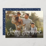 Festive Script Overlay Hanukkah Photo Holiday Card<br><div class="desc">Simple and chic Hanukkah photo card features your favourite family photo overlaid with "Happy Hanukkah" in white modern script lettering. Personalise with your family name and the year along the bottom. Cards reverse to a snow and stars pattern in rich navy blue and white.</div>