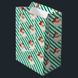 Festive Stripe Green Retro Santa Christmas Medium Gift Bag<br><div class="desc">This bright festive holiday gift bag features a bright Christmas stripe design with a retro Santa. The background colour can be customised.</div>