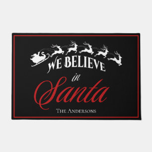 Festive We Believe in Santa black with red Doormat