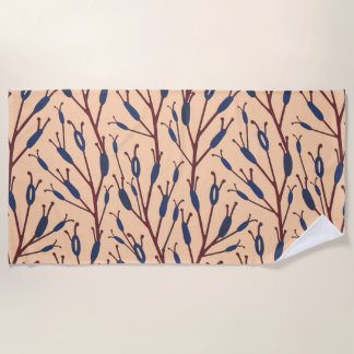 Field of Cat Tails against a Peach Background Beach Towel