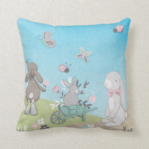 Field of spring bunnies cushion