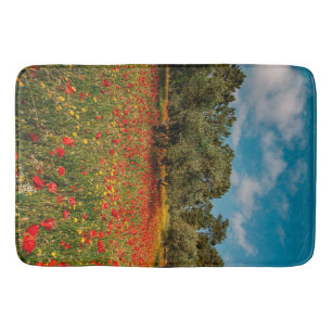 field with flowers and trees bath mat