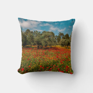 field with flowers and trees cushion