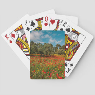 field with flowers and trees playing cards