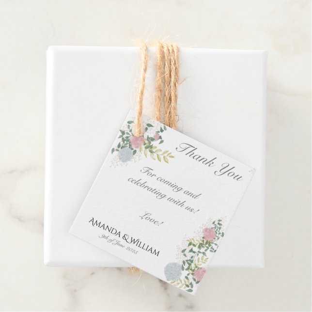 Finely flourished wedding favour tags (In Situ)