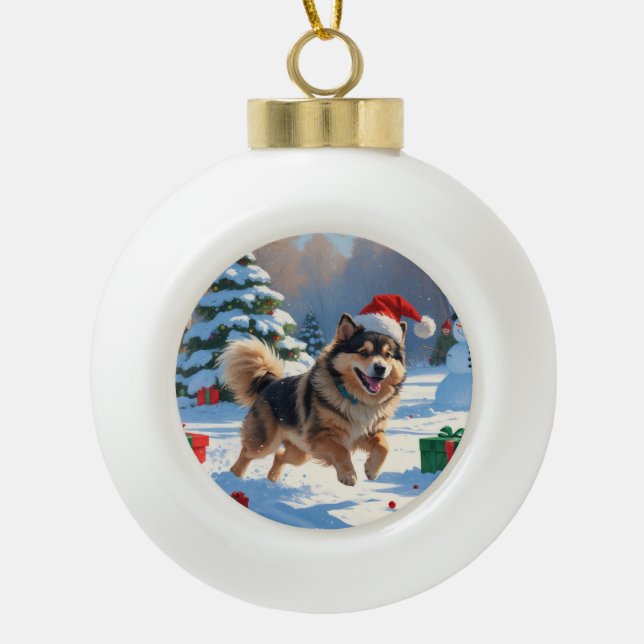 Finnish Lapphund Running Snow with Christmas Hat Ceramic Ball Christmas Ornament (Front)