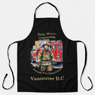 Firefighter ready by fire truck apron