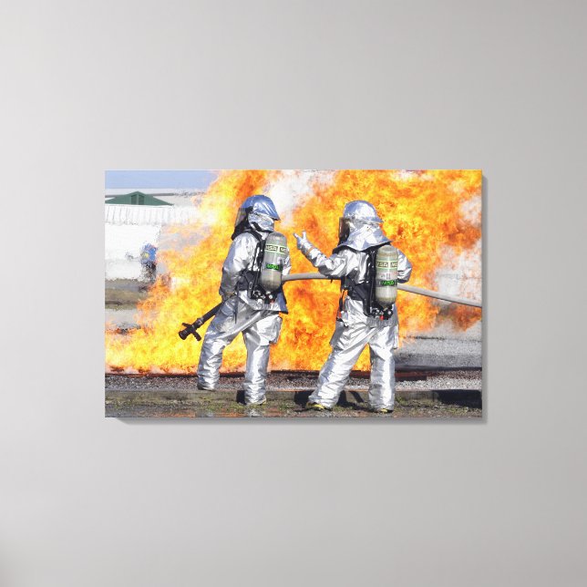 Firefighters battle a simulated fire canvas print (Front)