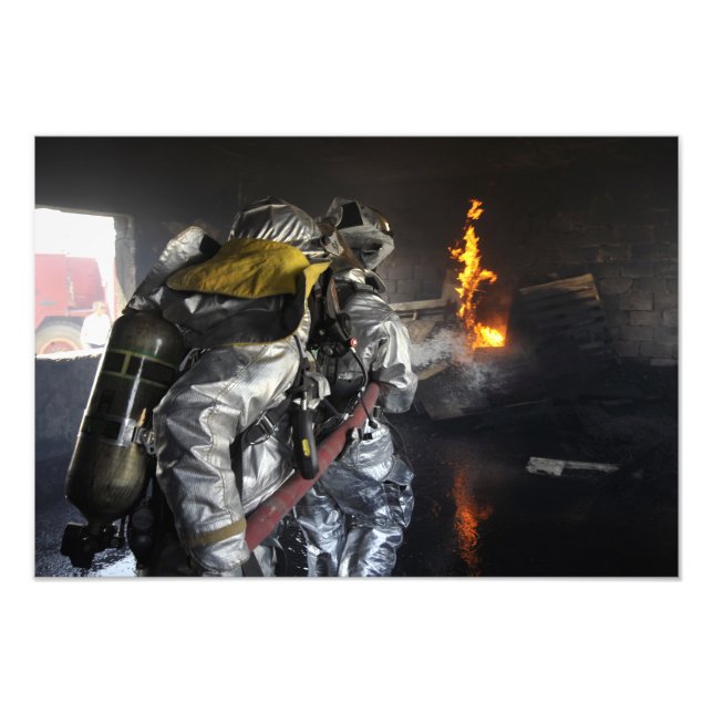 Firefighters extinguish a fire in a training ro photo print (Front)