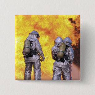 Firefighters extinguish an aircraft fire 15 cm square badge