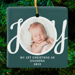 First Christmas As Grandma Photo Keepsake Green Ceramic Ornament<br><div class="desc">This keepsake "First Christmas As Grandma" photo ornament is decorated with the word 'JOY' in stylish script typography on a green background. Easily customisable.</div>