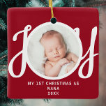 First Christmas As Nana Photo Keepsake Red  Ceramic Ornament<br><div class="desc">This keepsake "First Christmas As Nana" photo ornament is decorated with the word 'JOY' in stylish script typography on a red background. Easily customisable.</div>