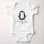 First Christmas Cute Winter Penguin Baby Bodysuit<br><div class="desc">This cute Christmas baby bodysuit features a winter penguin illustration. There is also space on the bib to add your own customisation: a name in whimsical typography. The perfect Christmas ‘first Christmas’ keepsake for any penguin lover this holiday season!</div>
