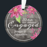 First Christmas Engaged Rustic Floral Ornament<br><div class="desc">One photo ornament with watercolor poinsettia flowers and adjustable text. Rustic wood textured background. Share your engagement photo and special moment with family and friends.</div>