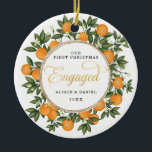 First Christmas Engaged Wedding Citrus Greenery Ceramic Tree Decoration<br><div class="desc">This citrus inspired Christmas ornament features beautiful hand-painted oranges and lush greenery. Great for a summer wedding!. The text fields are fully editable except for the word "Engaged". Simply remove this word by clicking the delete button and add your own text if you require a different word.</div>